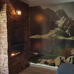 Szkolna Apartmán *